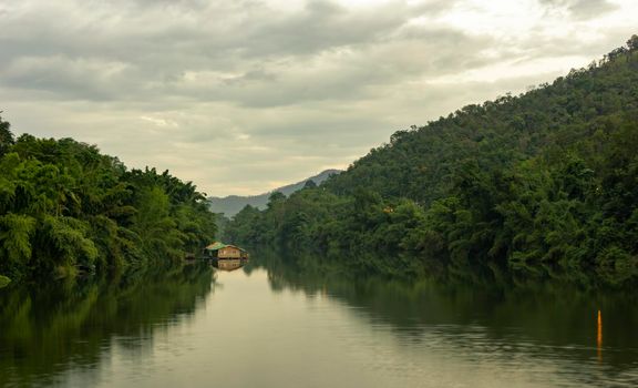 The atmosphere of rivers, mountains and the sky, looking at the Erawan Waterfall Park, Kanchanaburi, Thailand.