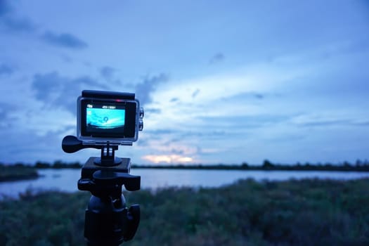 The camcorders have waterproof cases, setting the time to shoot the sky in the evening before it rains.