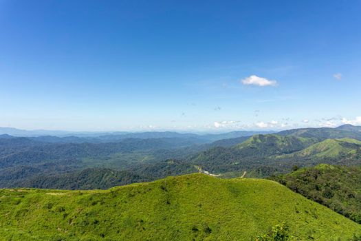 The scenery on the afternoon viewpoint. Mountains complex, Clear blue sky. Pilok Mine Viewpoint, Kanchanaburi, Thailand