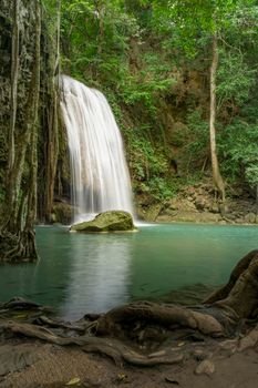Clean green emerald water from the waterfall Surrounded by small trees - large trees,  green colour, Erawan waterfall, Kanchanaburi province, Thailand