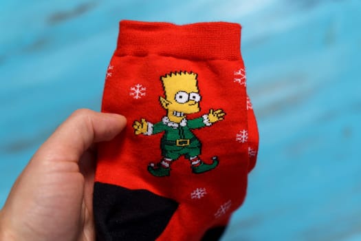 Tyumen, Russia-January 23, 2023: Socks with the image of Bart Simpson. The Simpsons is an American adult animated sitcom created by Matt Groening