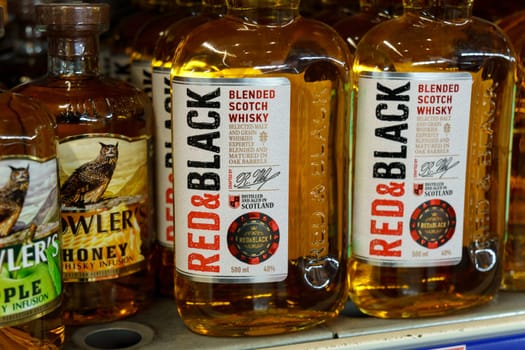 Tyumen, Russia-March 17, 2023: Red and Black whiskey is a real Scotch whiskey on the shelves of the store.