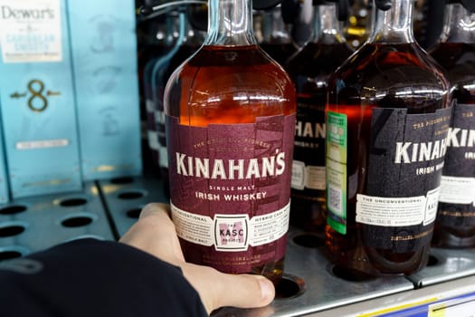 Tyumen, Russia-March 17, 2023: Bottle of Irish Whiskey Kinahans Single. Selective focus