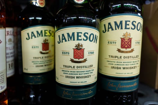 Tyumen, Russia-March 17, 2023: Jameson Irish Whiskey, blender on hypermarket shelves