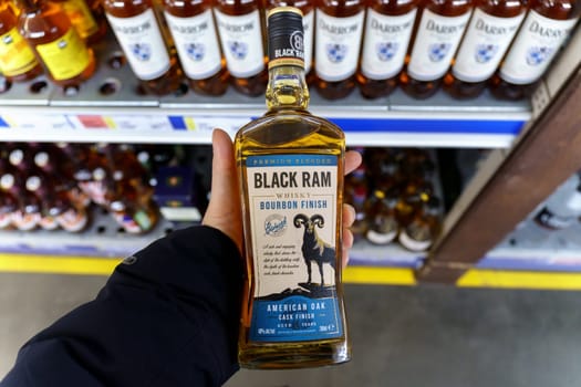 Tyumen, Russia-March 17, 2023: Whiskey brand Black Ram at supermarket. Strong alcoholic beverages. Selective focus