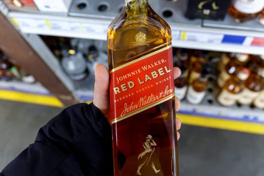 Tyumen, Russia-March 17, 2023: Johnnie Walker is the most widely distributed brand of blended Scotch whisky