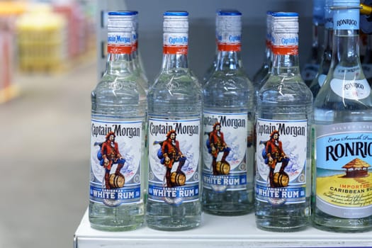 Tyumen, Russia-March 17, 2023: Captain Morgan original bottle white Rum. Elite alcohol production