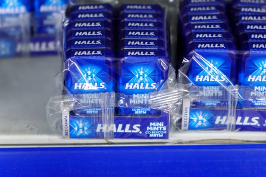 Tyumen, Russia-March 17, 2023: Halls mint candy displayed on shelves for sale at supermarket.