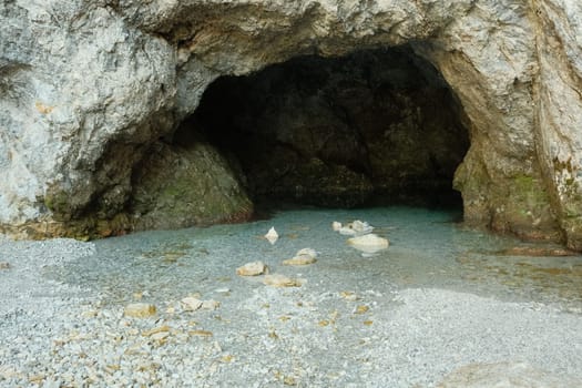 Crystal clear blue water at the Birnbachloch spring near Leogang, Austria