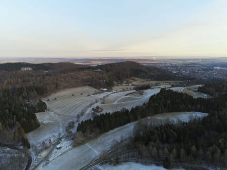 Aerial view of the city of Goslar in the Harz mountains from the Steinberg in winter, Germany