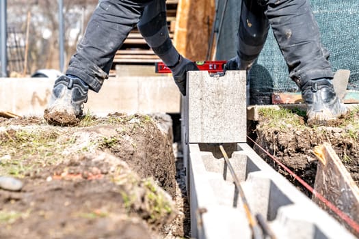 building the foundation of a house from a lost formwork.