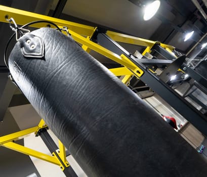 A closeup of a boxing punching bag in the sports complex