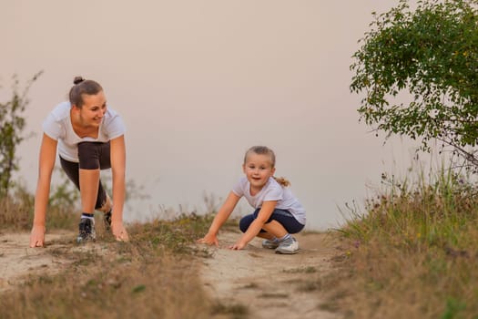 mother and daughter walking outdoors