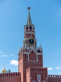 Spasskaya Tower of Moscow Kremlin at Red Square in winter Moscow Russia.