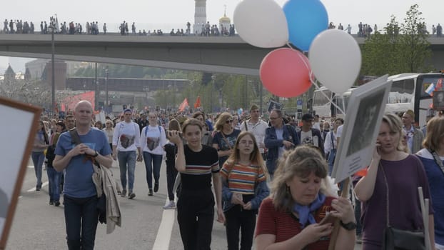 MOSCOW, RUSSIA , May 09, 2019: Over one million people of all ages take part in the Immortal Regiment parade celebrating the memory of loved ones fallen in WWII after the state Victory Parade.