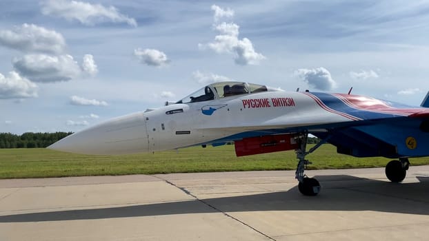 Moscow Russia Zhukovsky Airfield 25 July 2021: Aerobatic teams Russian Knights on planes Su-35 of the international aerospace salon MAKS-2021.