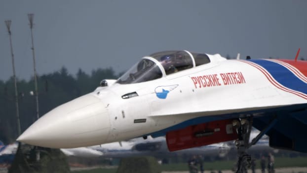 Moscow Russia Zhukovsky Airfield 25 July 2021: Aerobatic teams Russian Knights on planes Su-35 of the international aerospace salon MAKS-2021.