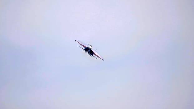 Moscow Russia Zhukovsky Airfield 25 July 2021: Aerobatic teams Russian Knights on planes Su-35 of the international aerospace salon MAKS-2021.