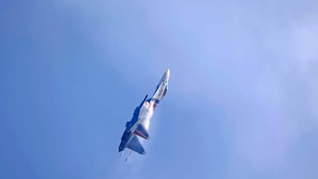 Moscow Russia Zhukovsky Airfield 25 July 2021: Aerobatic teams Russian Knights on planes Su-35 of the international aerospace salon MAKS-2021.