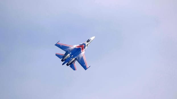 Moscow Russia Zhukovsky Airfield 25 July 2021: Aerobatic teams Russian Knights on planes Su-35 of the international aerospace salon MAKS-2021.