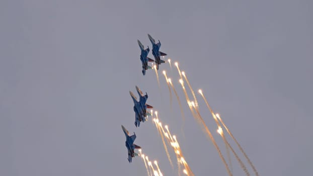 Moscow Russia Zhukovsky Airfield 25 July 2021: Aerobatic teams Russian Knights on planes Su-35 of the international aerospace salon MAKS-2021.