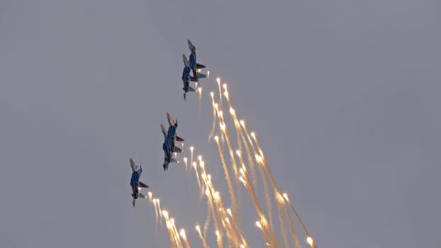 Moscow Russia Zhukovsky Airfield 25 July 2021: Aerobatic teams Russian Knights on planes Su-35 of the international aerospace salon MAKS-2021.
