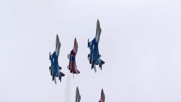 MOSCOW, RUSSIA - MAY 7, 2021: Avia parade in Moscow. group jet fighter aircraft MiG-35 and Su-30 in the sky on parade of Victory in World War II in Moscow, Russia