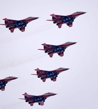 Moscow Russia Zhukovsky Airfield 25 July 2021: aerobatic team swifts MiG-29 perfoming demonstration flight of the international aerospace salon MAKS-2021.