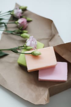 Rose floral handmade soap. Organic cosmetics concept. Natural vegan soap with rose fragrance.
