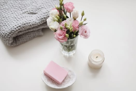 Rose floral handmade soap. Organic cosmetics concept. Natural vegan soap with rose fragrance.