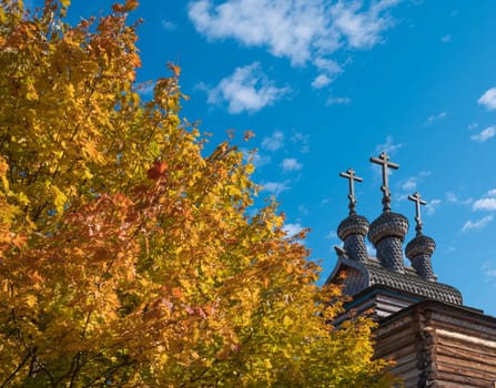 Autumn Landscape with a bell tower of the Church in Russia.