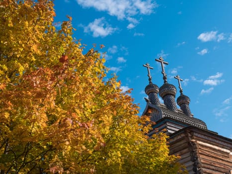 Autumn Landscape with a bell tower of the Church in Russia.
