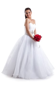 Pretty woman posing in wedding dress with bouquet, isolated on white