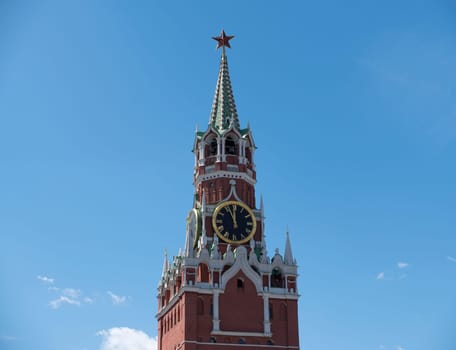 Moscow Kremlin Main Clock named Kuranti on Spasskaya Tower 12 hours . Red Square.