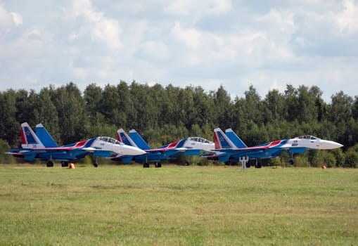 Moscow Russia Zhukovsky Airfield 31 August 2019: The Russian Knights Russkie Vityazi aerobatic team performs a demonstration flight with aerobatics figures of the international aerospace salon MAKS-2019.