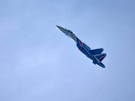 Moscow Russia Zhukovsky Airfield 31 August 2019: The Russian Knights Russkie Vityazi aerobatic team performs a demonstration flight with aerobatics figures of the international aerospace salon MAKS-2019.