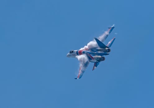 Moscow Russia Zhukovsky Airfield 31 August 2019: The Russian Knights Russkie Vityazi aerobatic team performs a demonstration flight with aerobatics figures of the international aerospace salon MAKS-2019.