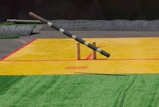 Russian national game Gorodki in which you need to knock out all the figures from the square with a wooden stick.