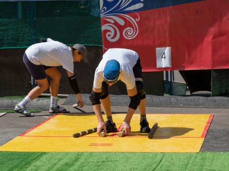 Man plays in the towns, sport Maintain the traditions inscription