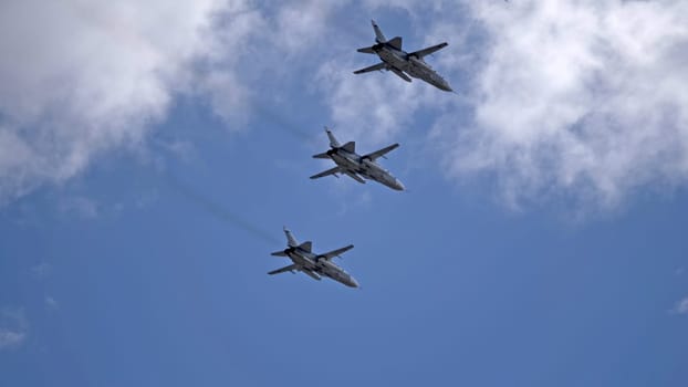 MOSCOW, RUSSIA - MAY 7, 2021: Avia parade in Moscow. jet fighter aircraft Su-24 in the sky on parade of Victory in World War II in Moscow, Russia