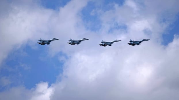 MOSCOW, RUSSIA - MAY 7, 2021: Avia parade in Moscow. jet fighter aircraft Su-35 in the sky on parade of Victory in World War II in Moscow, Russia