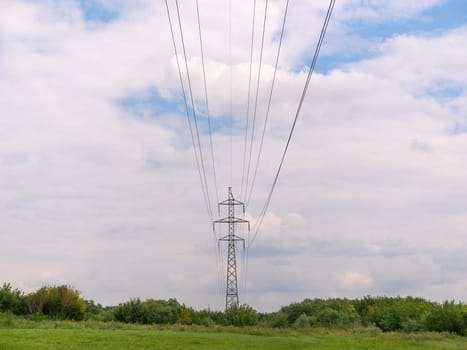 cloudy morning sky and a high-voltage line.