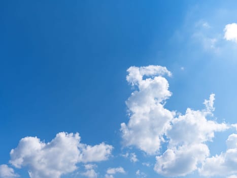 Beautiful blue sky with bright white clouds.