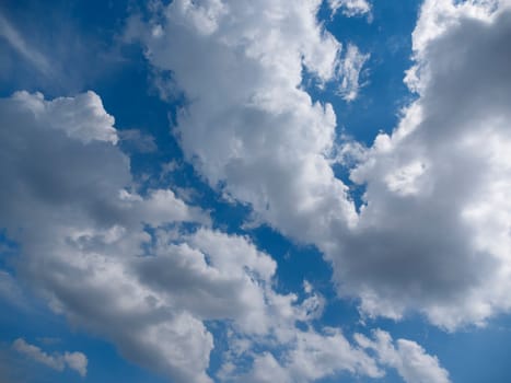 Beautiful blue sky with bright white clouds.
