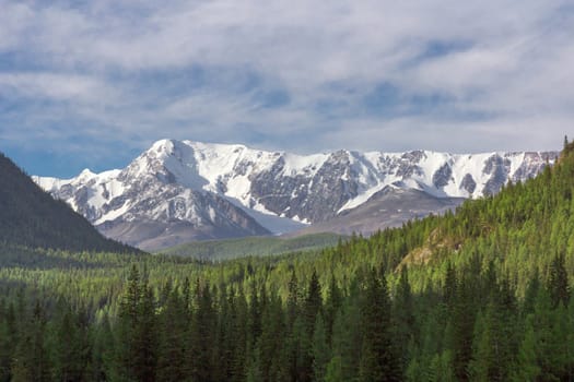 Beautiful winter landscape with snow covered mountain peaks.