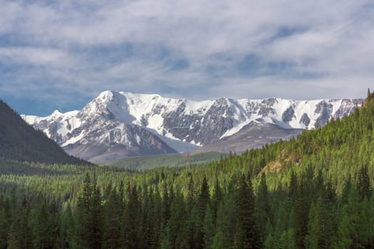 Beautiful winter landscape with snow covered mountain peaks.