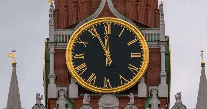 Moscow Kremlin Main Clock named Kuranti on Spasskaya Tower 12 hours . Red Square.