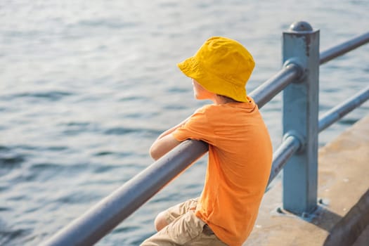 Portrait of Boy tourist with view of Golden Horn Bay, Istanbul, Turkey. Turkiye. Traveling with kids concept.