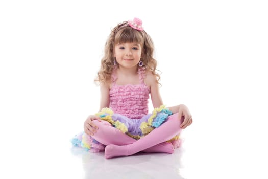 Image of cute little girl posing in candy costume, isolated on white
