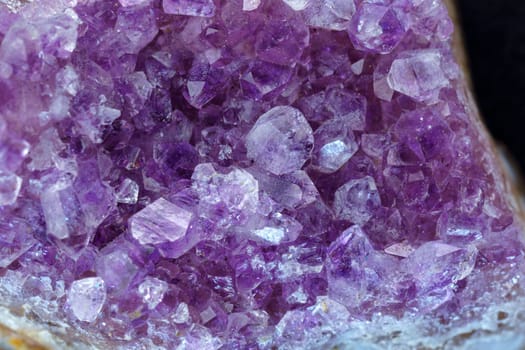 Purple rough amethyst quartz crystals. Promote calm, balance and peace. Raw, close up macro
